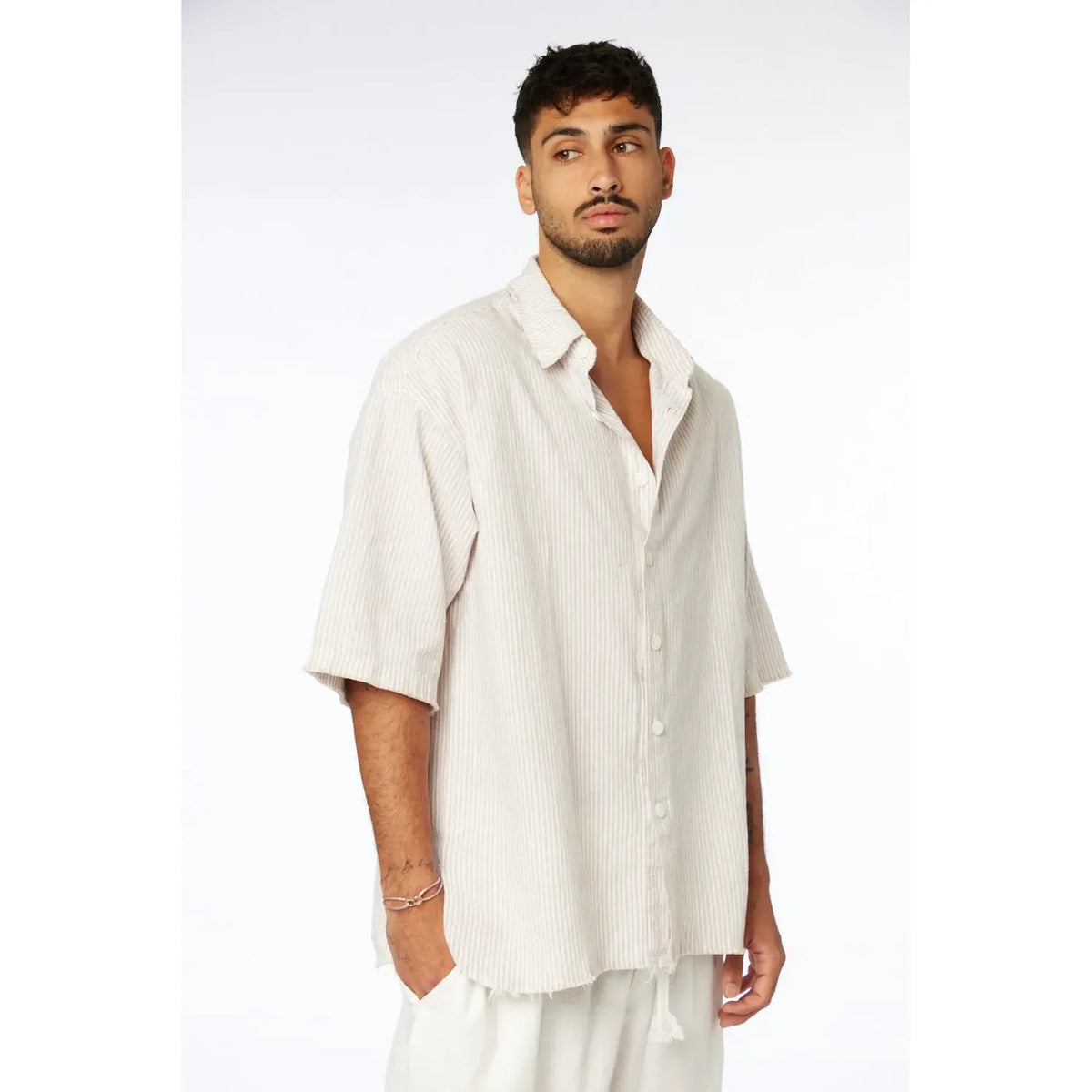Man wearing a Striped Linen Short Sleeve Button-Up Shirt in Stone