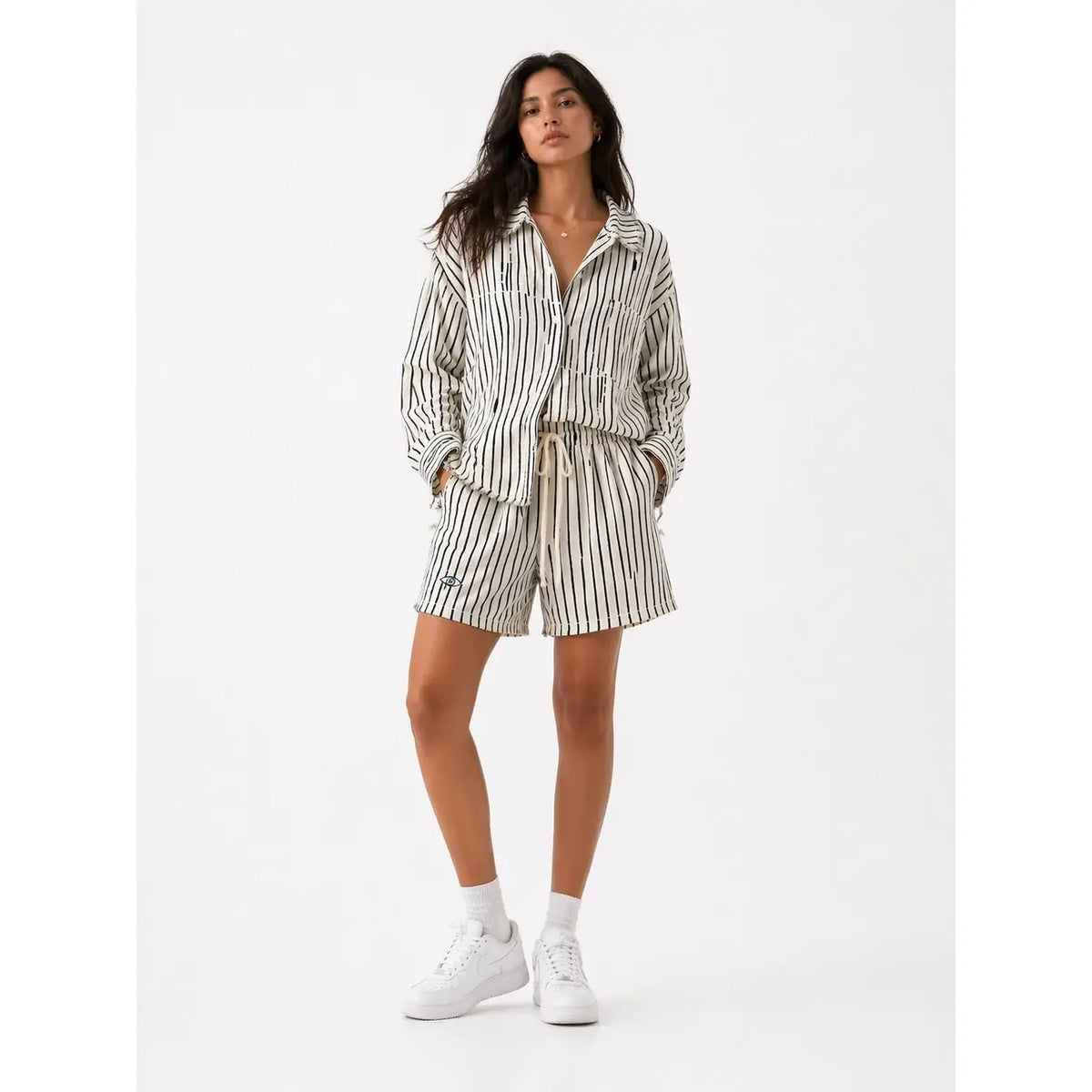 Woman wearing Soft linen shorts - Black Stripes with matching button-up shirt