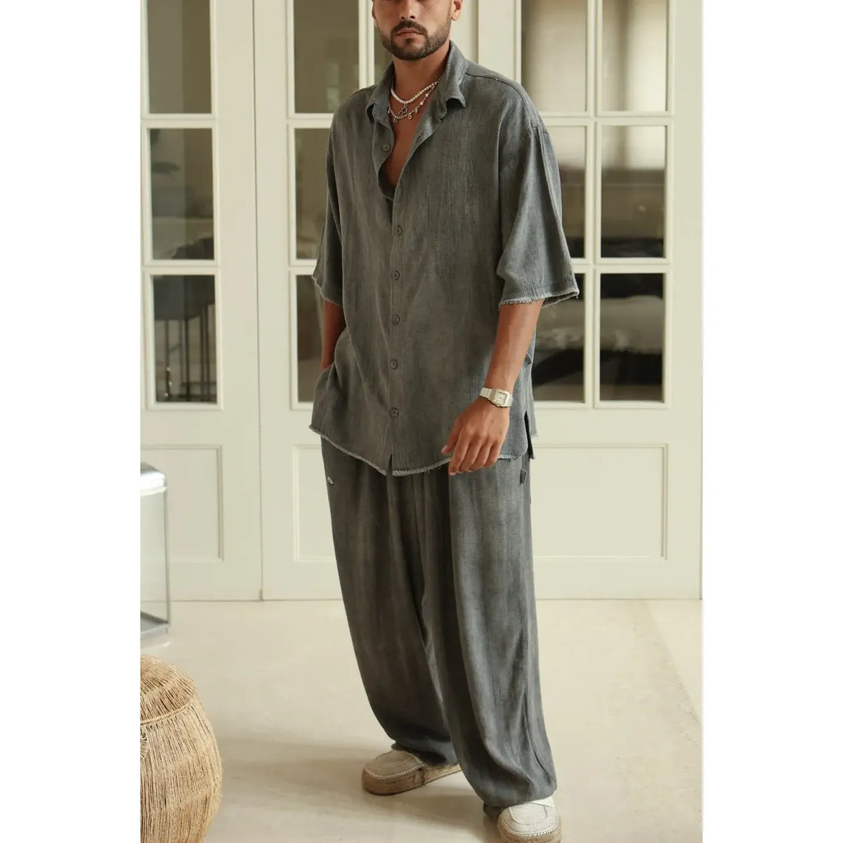 Man wearing Pure Grey Oversized Soft Linen Pants and matching shirt