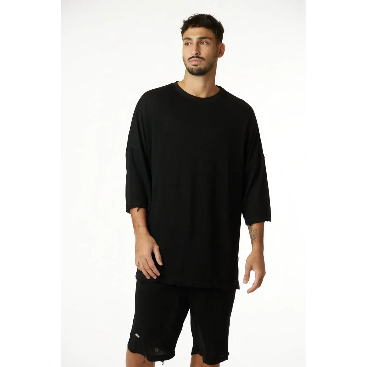 Man wearing 3/4 Sleeve Nicki Soft in black
